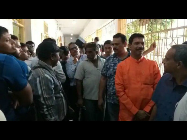 Congress and BJP leaders stand in line for casting vote