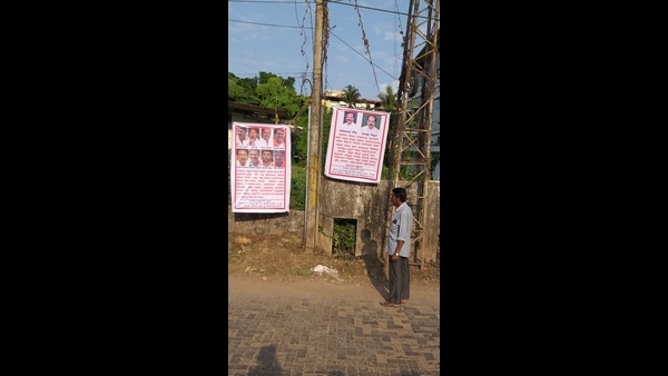 Banner movement against Sadananda Gowda and Veerappa moily 