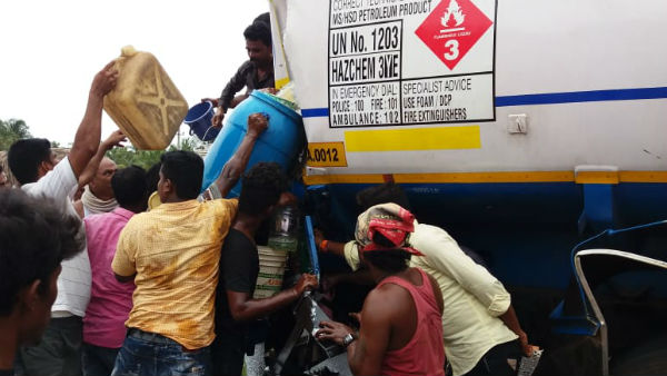 diesel tanker accident people rushed to fill it