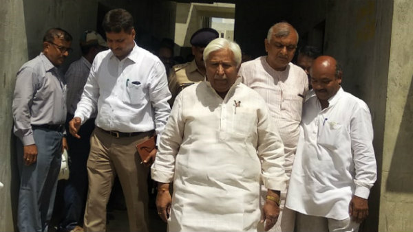 HK Patil urges to speed up Ashraya Scheme house construction work 