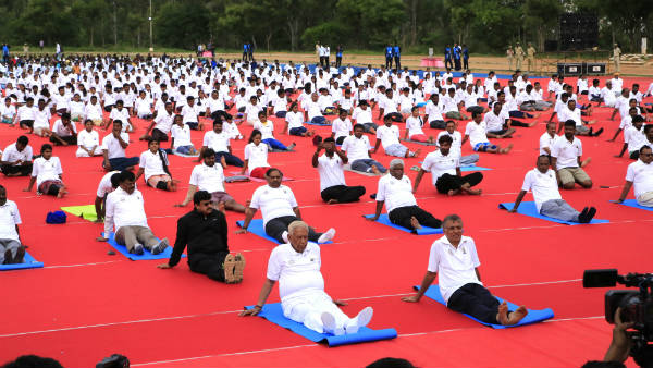 Karnataka governor Vajubhai Vala participates in Yoga Day