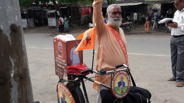 bjp lok sabha PM narendra Modi met KhimchandBhai cycle gujarat bjp lok sabha PM narendra Modi met KhimchandBhai cycle gujarat
