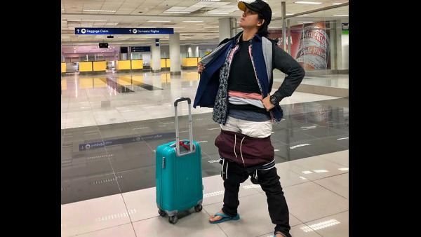 A Woman Passenger In An Airline Wears 2.5 KG Of Cloths To Avoid Extra Baggage Fees A Woman Passenger In An Airline Wears 2.5 KG Of Cloths To Avoid Extra Baggage Fees