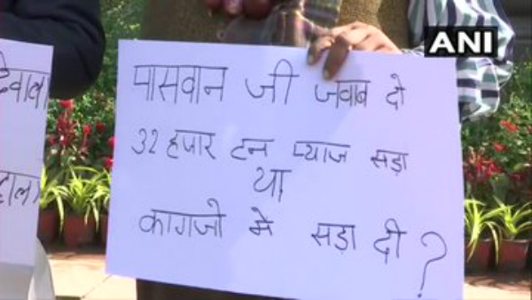 AAP MPs Hold Protest In Parliament Premises Against Rise In Onion Prices. 