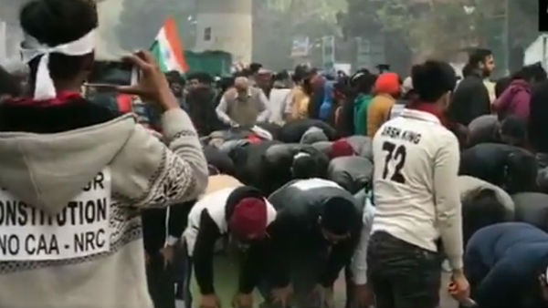 Citizenship Amendment Act: Muslim Peoples Namaz Outside The Gates Of Jamia University. Citizenship Amendment Act: Muslim Peoples Namaz Outside The Gates Of Jamia University.