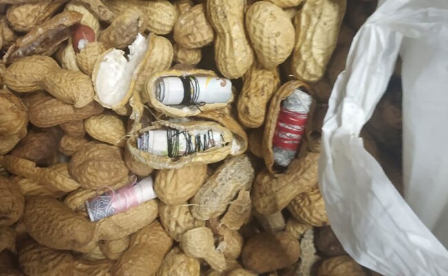 New Delhi: Foreign Currency in Peanut, Meatballs And Biscuits 
