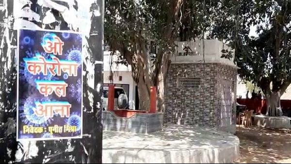 Coronavirus: A Man puts O Corona Kal Aana posters on the walls of the houses Coronavirus: A Man puts O Corona Kal Aana posters on the walls of the houses