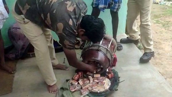 Transporting Liquor Inside A Musical Instrument At HD Kote
