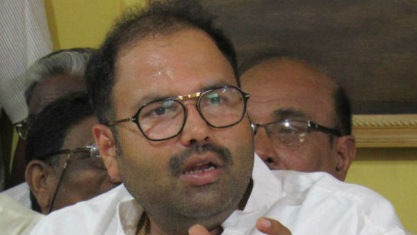 CISF Pesonnel Detained Anand Asnotikar For Carrying Pistol At KIAL CISF Pesonnel Detained Anand Asnotikar For Carrying Pistol At KIAL