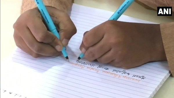 Mangaluru: 16 Year old Girl Record By Writing In Both Hands At The Same Time