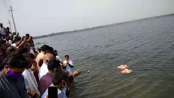 BC Patil Offered Bagina To Durgadevi Lake In Hirekerur In Haveri District