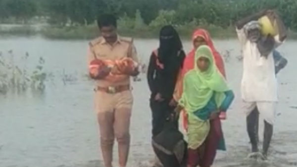 Sangamesh Angadi Evacuated Family Of Flood Victims Who Struggling To Cross Bridge