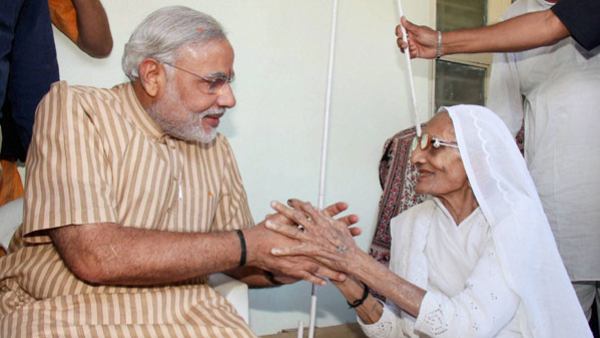 PM Modi And His Mother Hiraben Abused By A Caller During BBC Radio Show In UK PM Modi And His Mother Hiraben Abused By A Caller During BBC Radio Show In UK