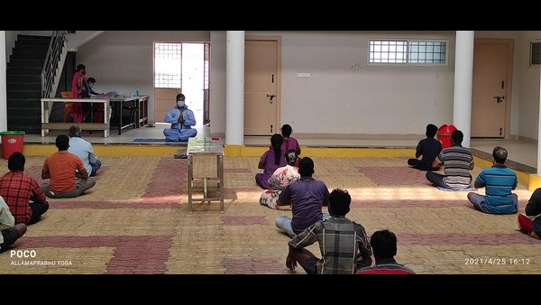  Yoga Teacher Teaching Yoga To COVID Patients At KR Pet 