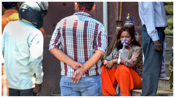 ಕೊರೊನಾದಿಂದಗುಣಮುಖರಾಗಿ ಮರಳಿದ ಮಹಿಳೆಗೆ ಸ್ವಾಗತ 