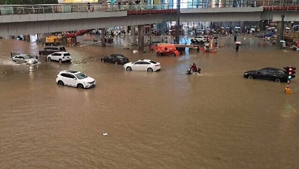 At Least 12 Killed In Central China Flooding After Being Trapped In Subway, Cars