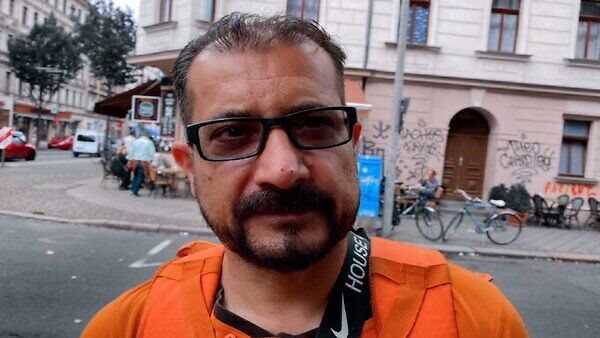 Former Afghan minister Syed Ahmad works as pizza delivery boy in Germany Former Afghan minister Syed Ahmad works as pizza delivery boy in Germany