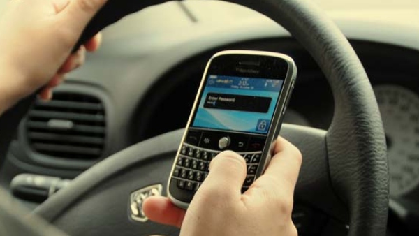 Using mobile phone through Bluetooth, earphones illegal while driving or riding says Bengaluru Police