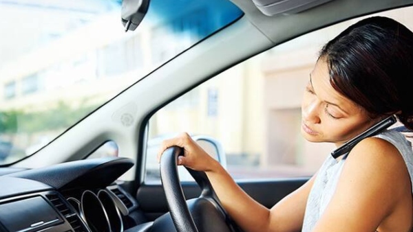 Using mobile phone through Bluetooth, earphones illegal while driving or riding says Bengaluru Police