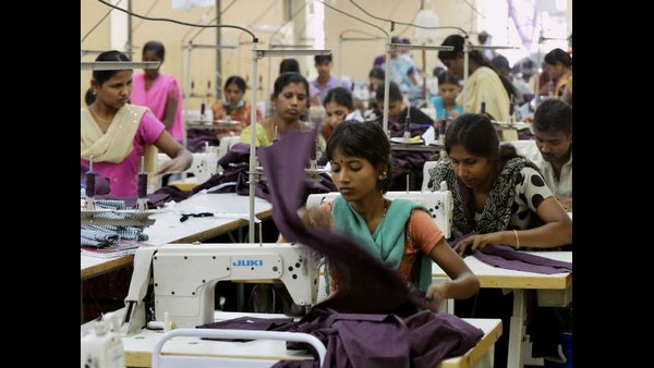 Bengaluru: Free bus pass likely to bring relief for women garment employees