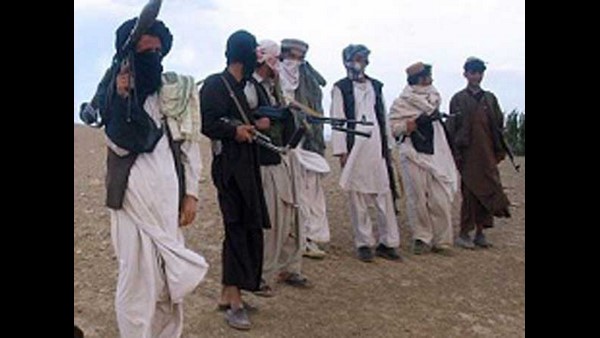 How did female footballers escape the Taliban-occupied Afghanistan?