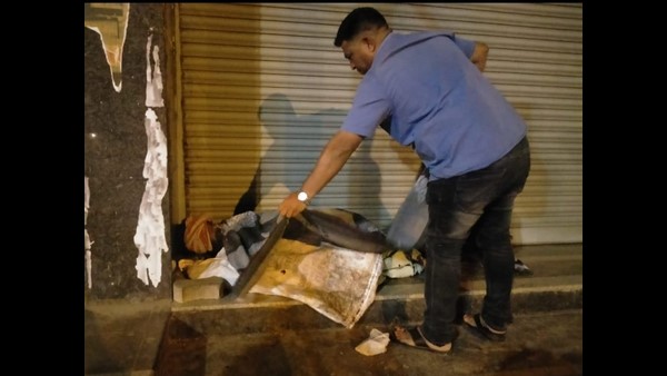 Group of Youths Distribute Warm Blankets to Refugees Sleeping in the Cold