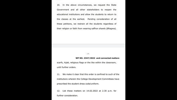 Karnataka High Court Issued Interim Order on Karnataka Hijab Row ; says colleges can open but no religious dress to be worn. Karnataka High Court Issued Interim Order on Karnataka Hijab Row ; says colleges can open but no religious dress to be worn.