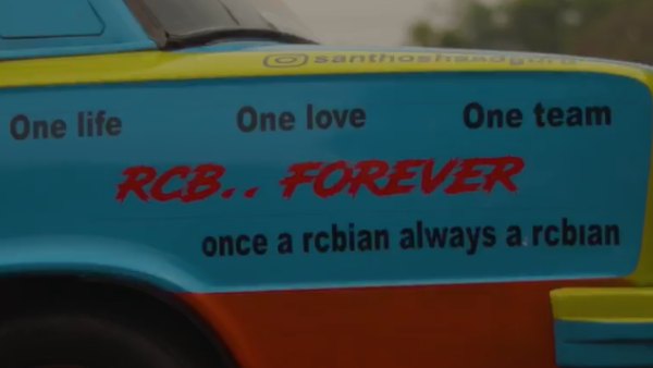RCB Fan Designed Car As RCB Car Video Goes Viral RCB Fan Designed Car As RCB Car Video Goes Viral