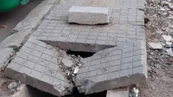Residents Urge MLA and BBMP to Fix Footpath Damaged Near Ejipura Signal
