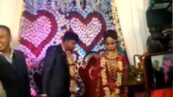 Video of bride-grooms high drama on the wedding platform