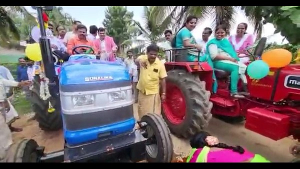 Renukacharya drives tractor during Village Stay program in his Honnali constituency