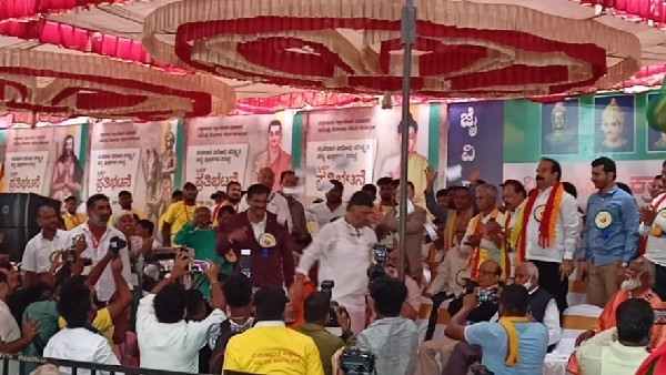 KPCC President DK Shivakumar Tears The Copy Of A Revised Textbook