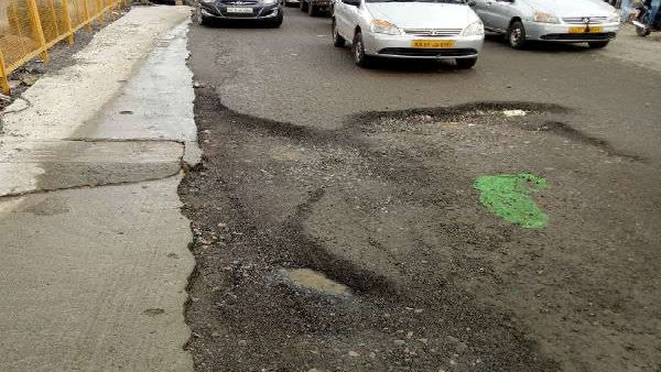 Modi visit to the state: AAP demands him to see the Bengaluru road potholes Modi visit to the state: AAP demands him to see the Bengaluru road potholes