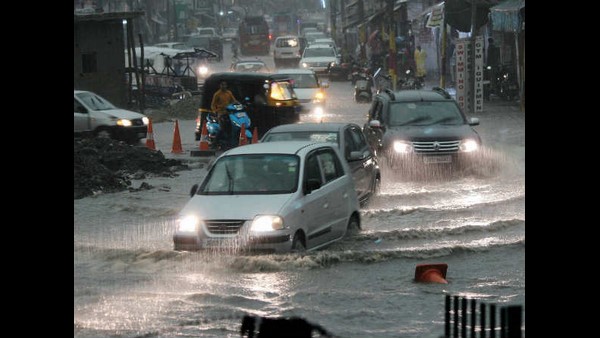 Heavy Rainfall Under in Mahadevapur Zone: A man washed away in Rajakaluve 
