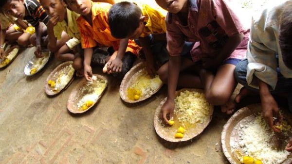 Midday Meal : Children prefer Serving them food at school over taking ration home, says study