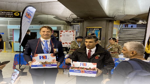 Commuters surprised as UK PM Rishi Sunak sells poppies at London tube station Commuters surprised as UK PM Rishi Sunak sells poppies at London tube station