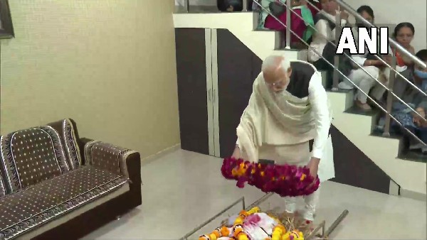 PM Narendra Modi pays respect to his mother Heeraben Modi at Gandhinagar residence