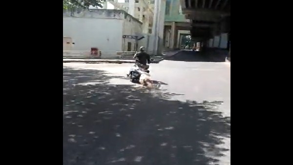 Bike Rider Dragged Man when he tries to stop him after hit his Car on Magadi Road; Video Goes Viral Bike Rider Dragged Man when he tries to stop him after hit his Car on Magadi Road; Video Goes Viral