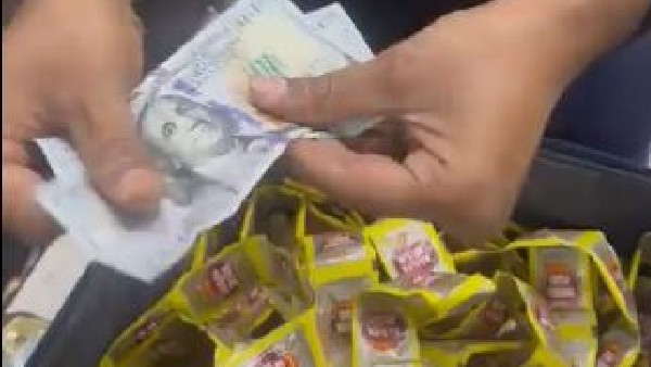 A Passenger Arrested He Trying To Fly To Bangkok with 40,000 Dollars In Pan Masala Sachet A Passenger Arrested He Trying To Fly To Bangkok with 40,000 Dollars In Pan Masala Sachet