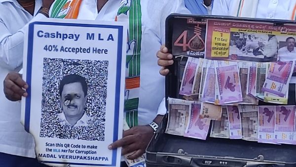 Congress protest against mla madal virupakshappa in Across Davanagere
