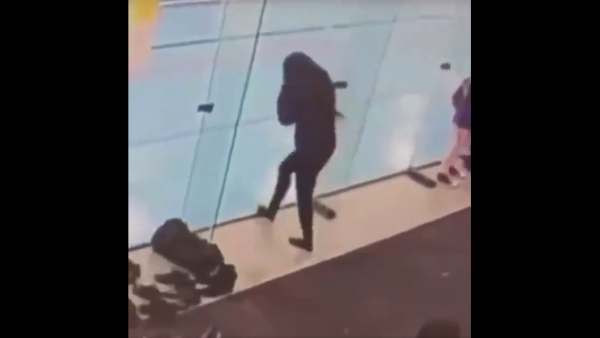 A Girl Smashes Her Head On To A Glass Thrice: Video Gone Viral