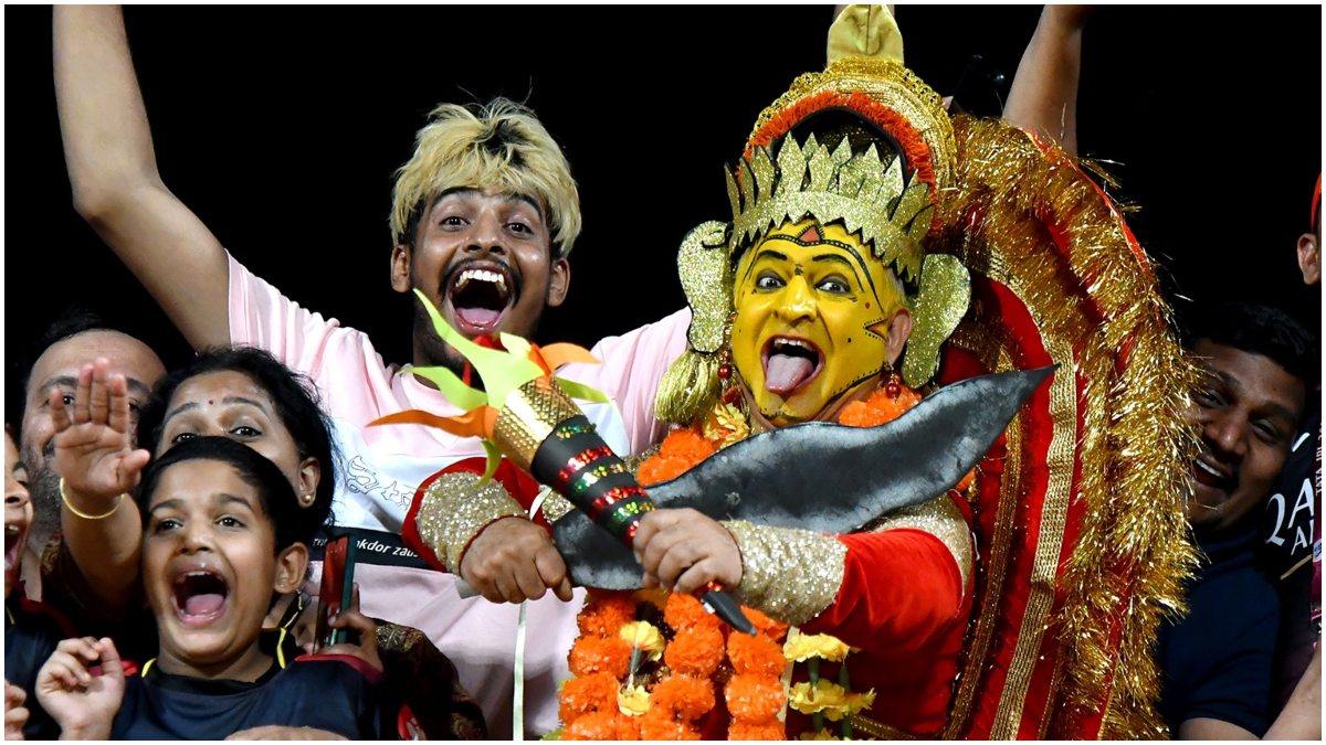 Person Attend With Panjurli Costume During RCB Match At Chinnaswamy IPL 2023 Person Attend With Panjurli Costume During RCB Match At Chinnaswamy IPL 2023