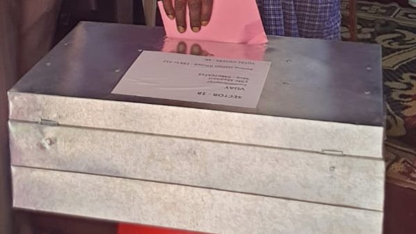 Woman Voted In front of Husband Dead Body