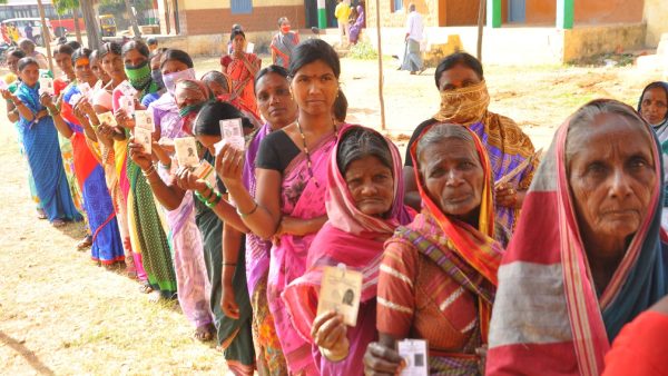 Bringing Voters To Polling Booth From Vehicle Is Offense 