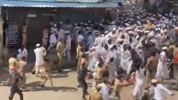 Lathicharge on Krishna devotees