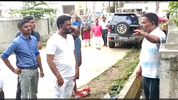 Rain damage: A Women outrage against Swaroop Prakash in Hassan