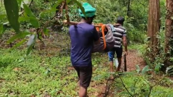 The Family Members Carried The Patient In A Sack For No Road At Village
