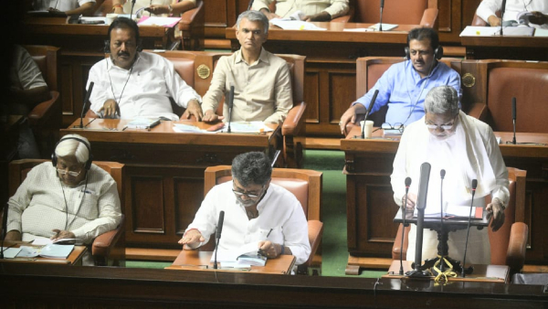 A lawyer who was sitting in the MLAs seat while Siddaramaiah was presenting the budget was arrested