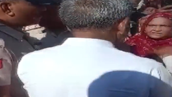 Haryana floods: Woman slaps JJP MLA who came for poll - video Haryana floods: Woman slaps JJP MLA who came for poll - video