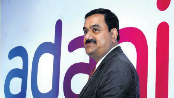 visa-ties-up-with-adani-group